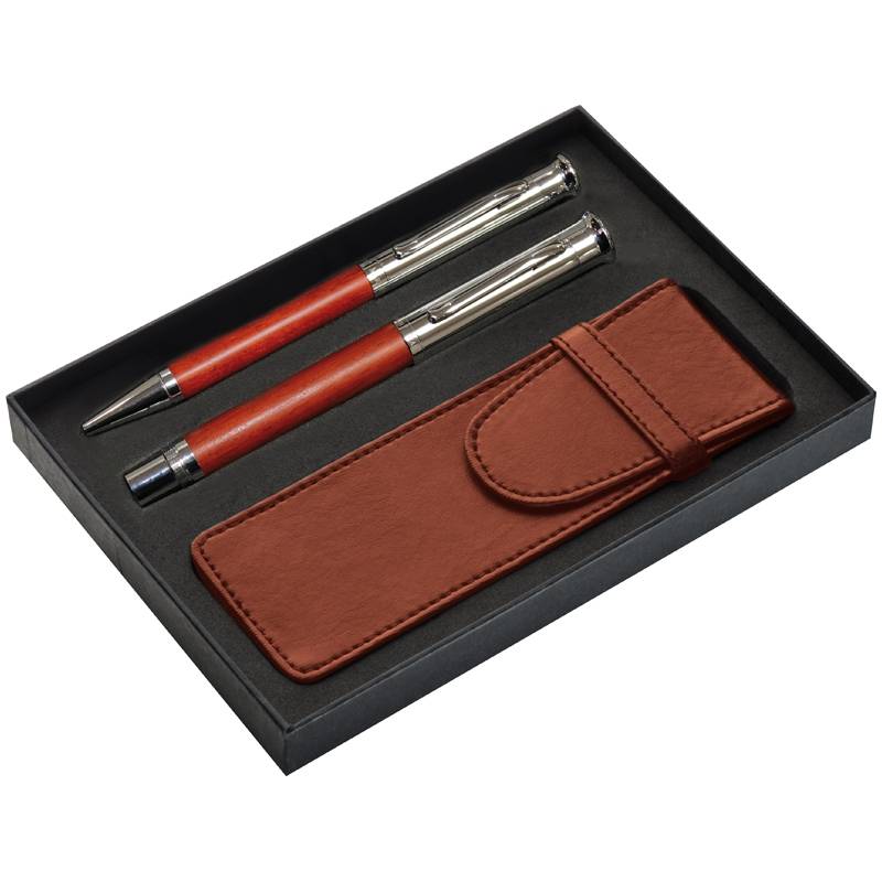 Psací souprava obsahující kuličkové pero a plnící pero, modrá náplň a pouzdro