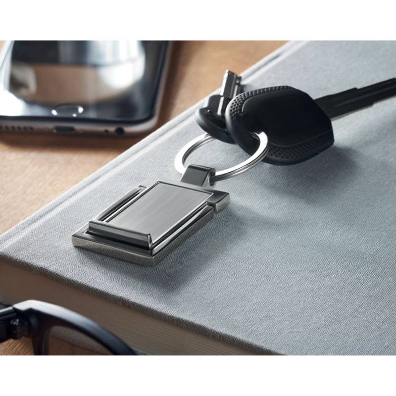 Kľúčenka a stojan na telefón, sivá strieborná Kľúčenka a stojan na telefón, sivá strieborná