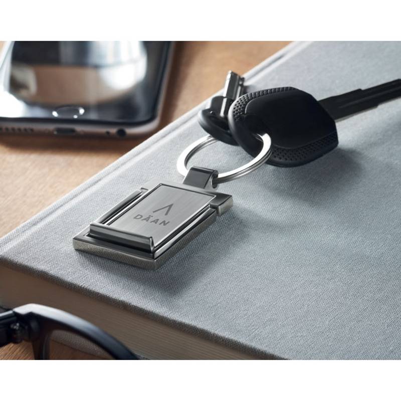 Kľúčenka a stojan na telefón, sivá strieborná Kľúčenka a stojan na telefón, sivá strieborná